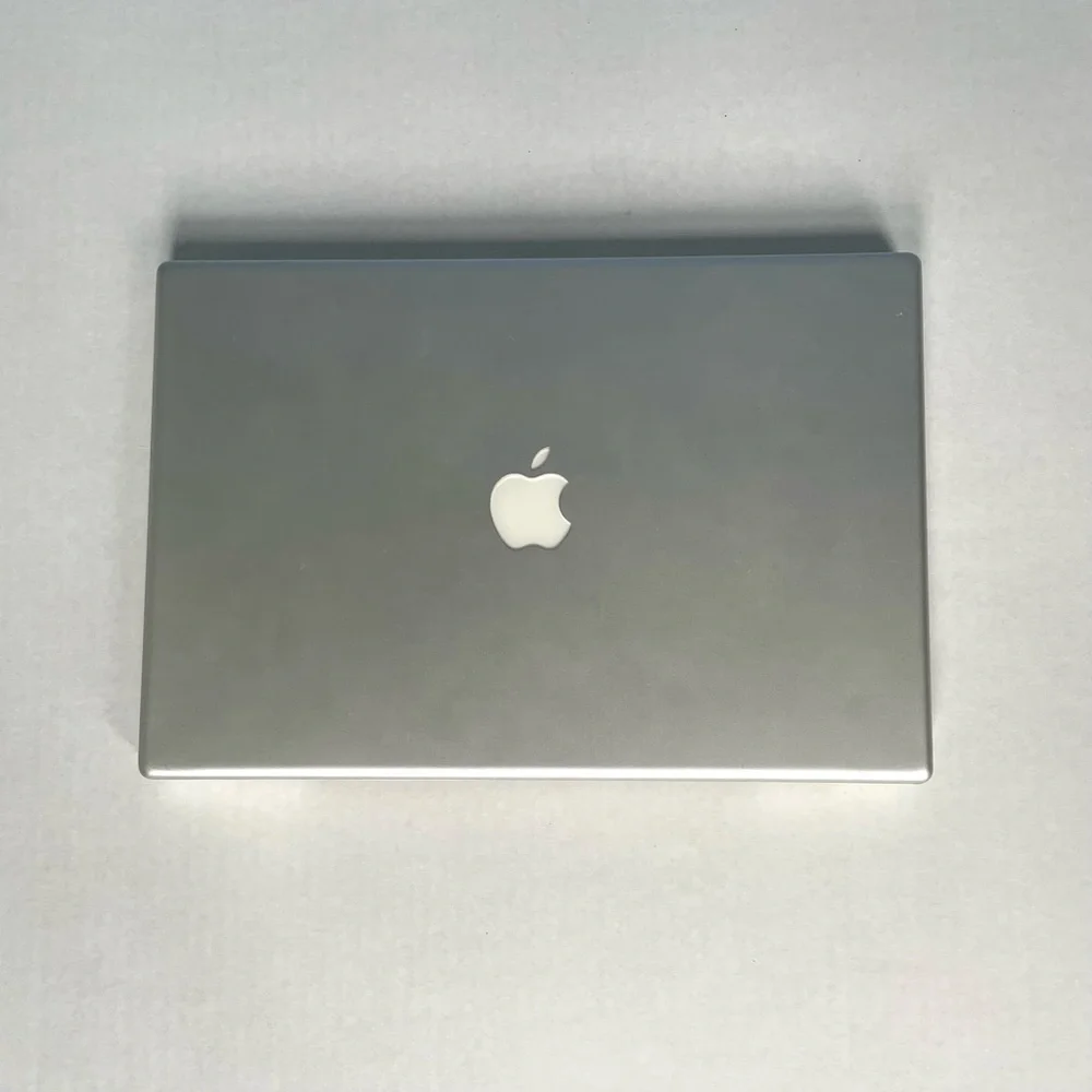 Working Apple MacBook Pro 15” laptop with adapter, 2.16 GHz Intel Core 2 Duo